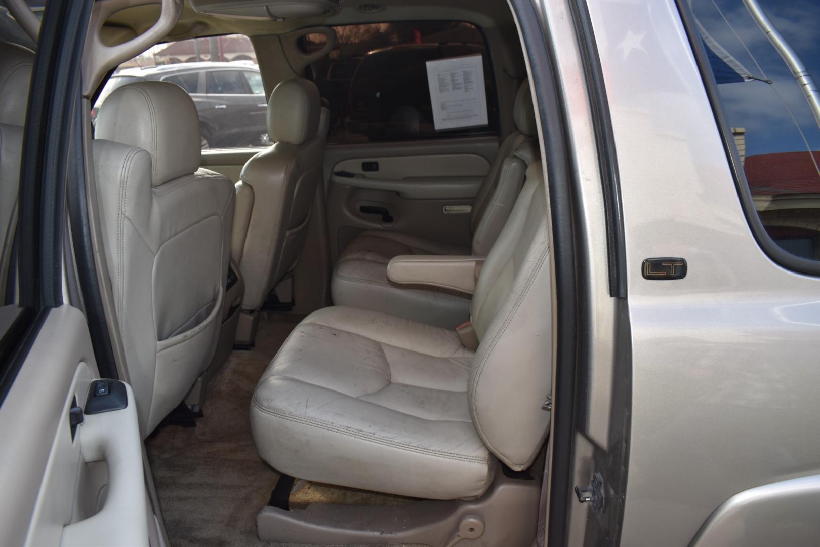 2003 Gold /Tan Chevrolet Suburban (1GNEC16Z23J) with an V8, 5.3.0L engine, 4 SPEED AUTOMATIC transmission, located at 5925 E. BELKNAP ST., HALTOM CITY, TX, 76117, (817) 834-4222, 32.803799, -97.259003 - Buying a 2003 Chevrolet Suburban can offer several benefits, including: Spaciousness: The Suburban is known for its ample interior space, making it great for large families, hauling cargo, or even converting into a camper. Towing Capacity: It's equipped with a robust engine and frame, allowing it - Photo#19